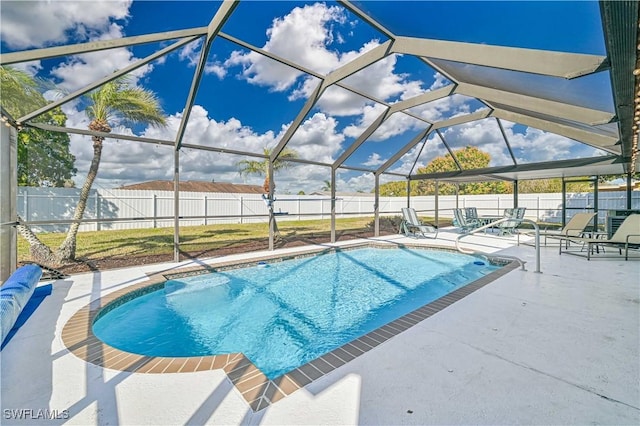 view of pool featuring a lanai and a patio area