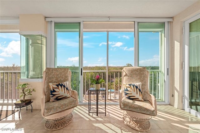 2619 Wulfert Rd Unit 5, Sanibel, FL 33957 - sunroom / solarium featuring tile patterned floors and floor to ceiling windows