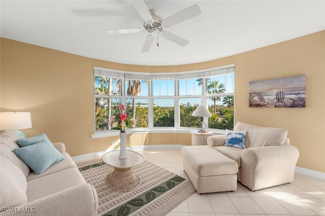 2619 Wulfert Rd Unit 5, Sanibel, FL 33957 - living area with baseboards, light tile patterned floors, and ceiling fan