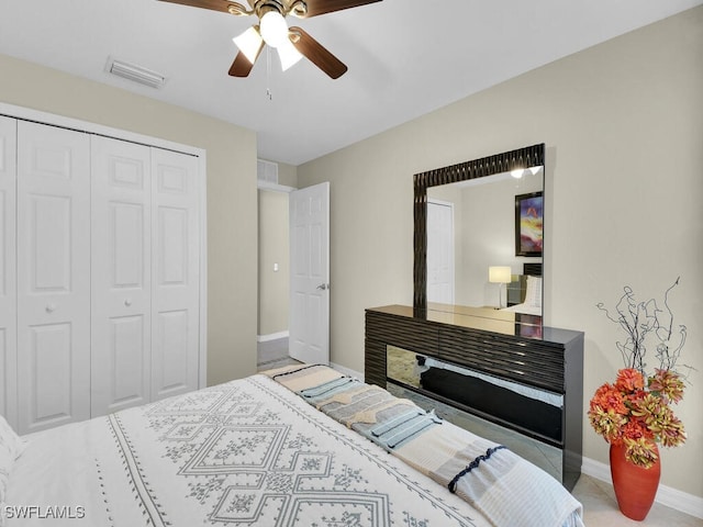 bedroom featuring a closet and ceiling fan