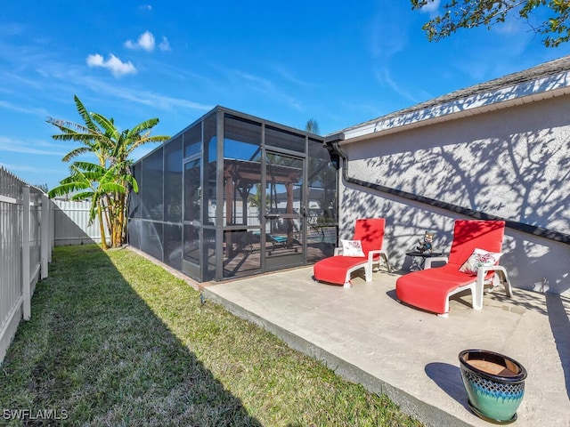 view of patio / terrace featuring glass enclosure