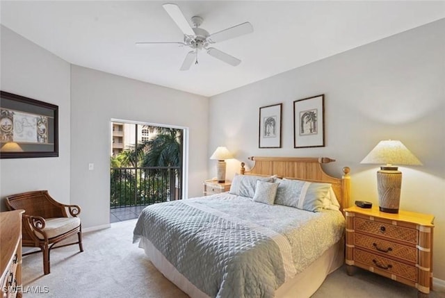 carpeted bedroom featuring access to outside and ceiling fan