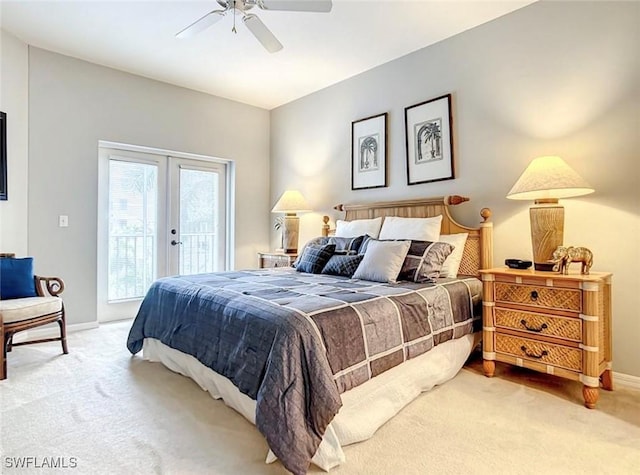 carpeted bedroom with access to outside, ceiling fan, and french doors