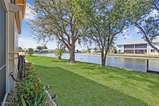 view of yard with a water view