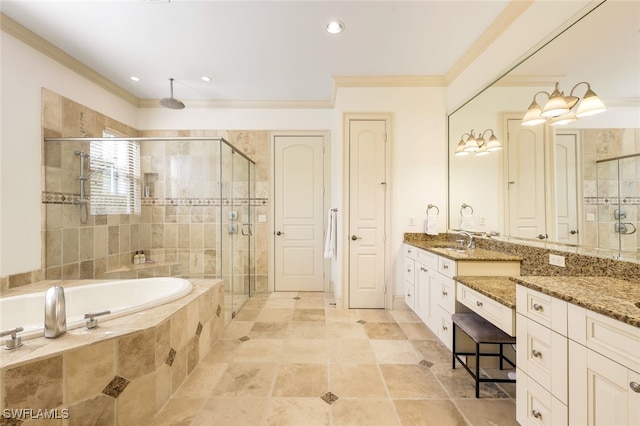 bathroom with vanity, ornamental molding, and plus walk in shower