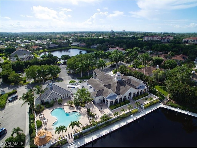 birds eye view of property with a water view