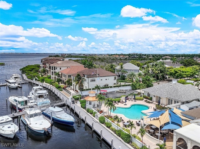 drone / aerial view with a water view