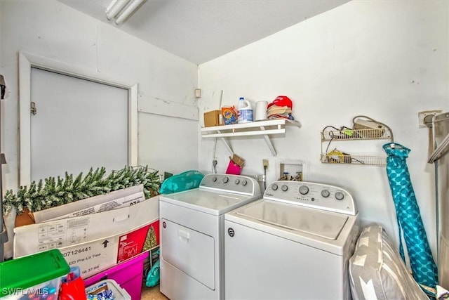 laundry area featuring independent washer and dryer