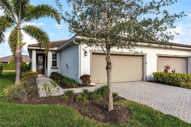 view of front of property with a garage