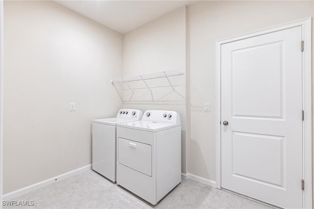 laundry area with washer and dryer