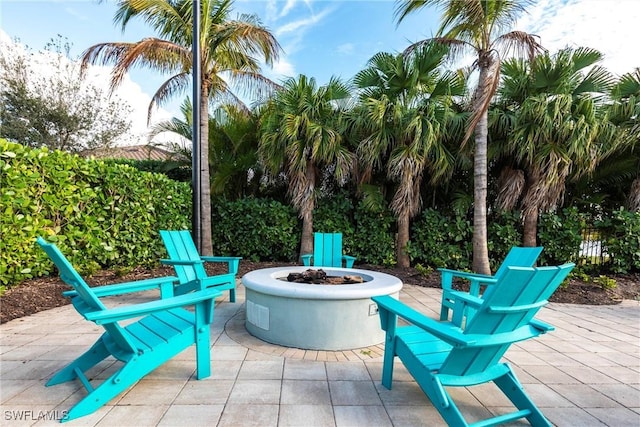 view of patio / terrace with a fire pit