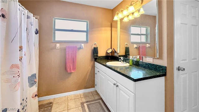 bathroom featuring vanity and tile patterned floors