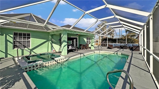 view of pool with an outdoor living space, a jacuzzi, a patio area, and glass enclosure