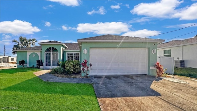 single story home with central AC unit, a garage, and a front lawn