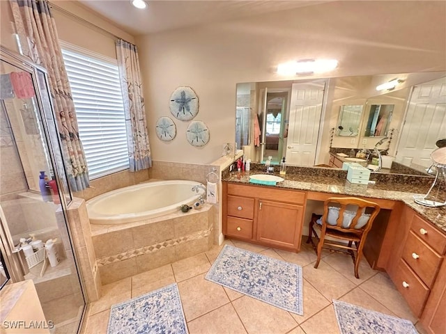 28880 Kiranicola Ct, Bonita Springs, FL 34135 - full bath featuring a garden tub, tile patterned flooring, vanity, and a stall shower