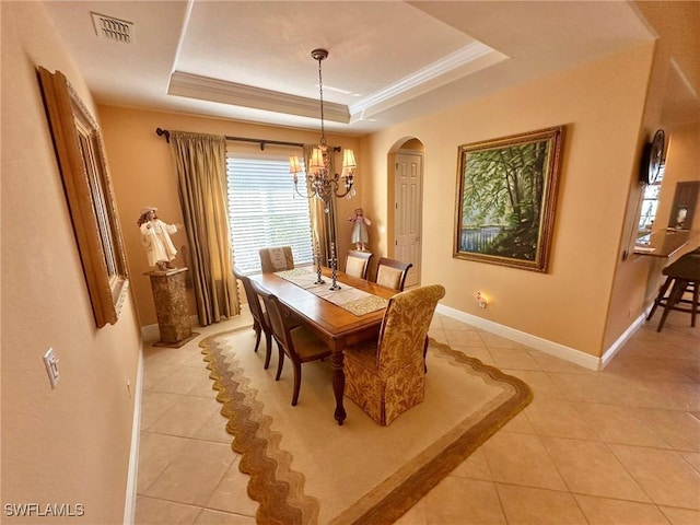 28880 Kiranicola Ct, Bonita Springs, FL 34135 - dining room featuring light tile patterned floors, a raised ceiling, a chandelier, baseboards, and ornamental molding