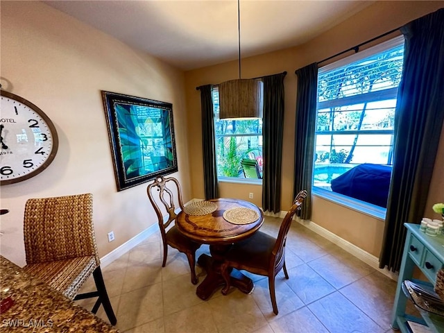 28880 Kiranicola Ct, Bonita Springs, FL 34135 - dining room with plenty of natural light, baseboards, and light tile patterned flooring