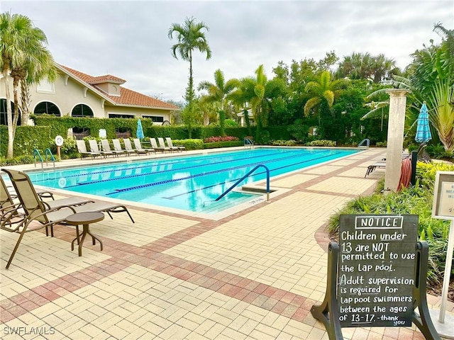 pool featuring a patio area