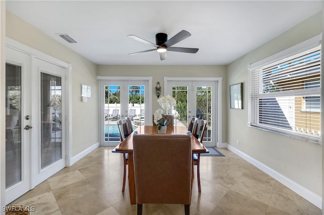 dining area featuring french doors and ceiling fan