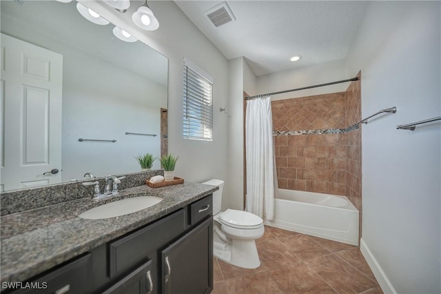 full bathroom with vanity, tile patterned flooring, toilet, and shower / bath combo