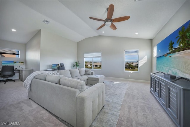 carpeted living room with vaulted ceiling and ceiling fan