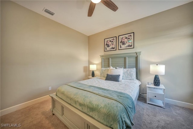 bedroom with light carpet, lofted ceiling, and ceiling fan