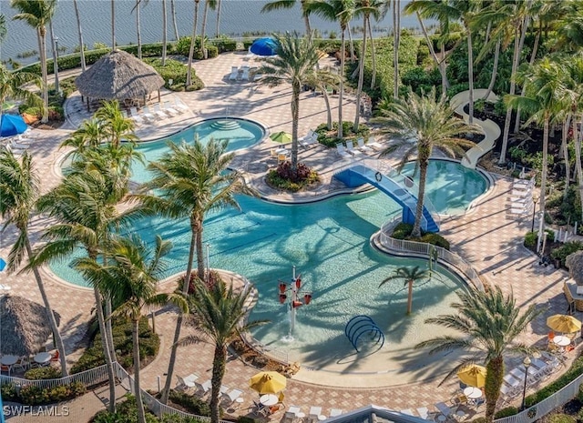 view of pool featuring fence