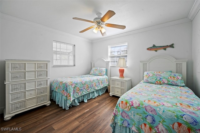 bedroom with dark hardwood / wood-style flooring, crown molding, and ceiling fan