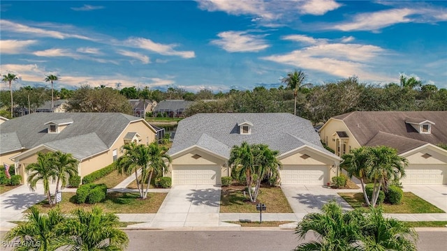 birds eye view of property with a residential view