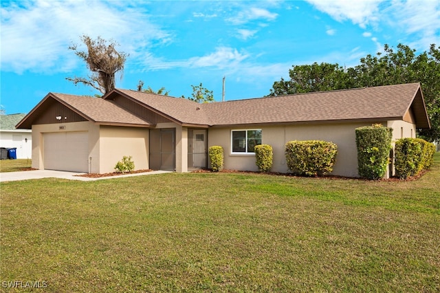 ranch-style house with a garage and a front yard