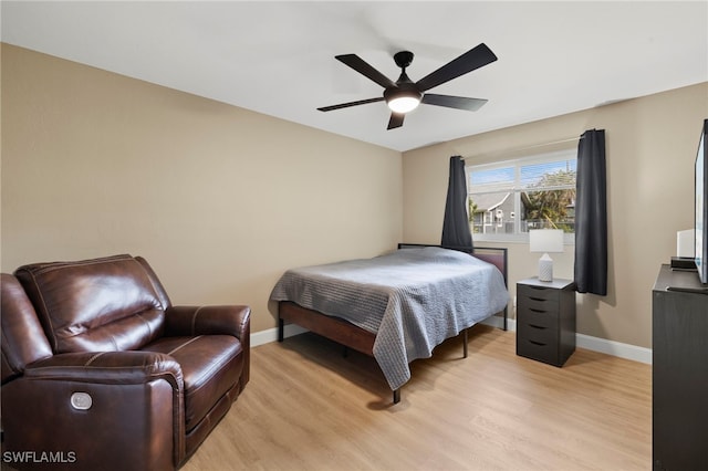 bedroom featuring ceiling fan and light hardwood / wood-style floors