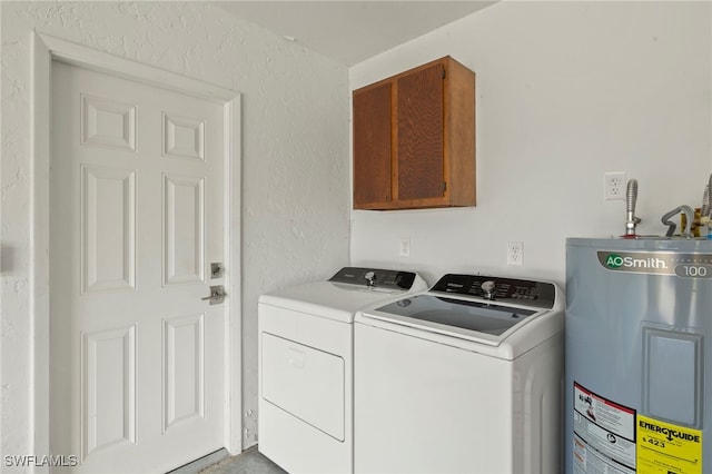 laundry room featuring independent washer and dryer, cabinets, and electric water heater