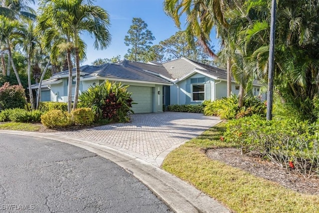 view of front of home with a garage