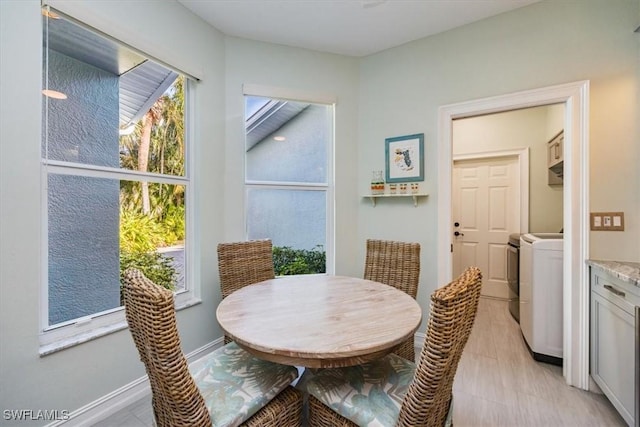 dining room featuring washer / dryer