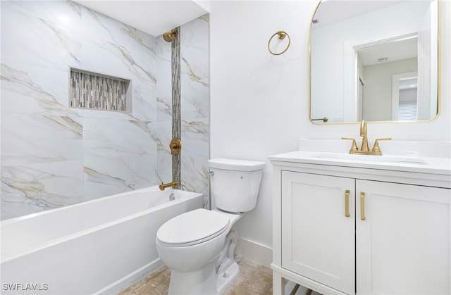 full bathroom featuring tiled shower / bath combo, vanity, and toilet