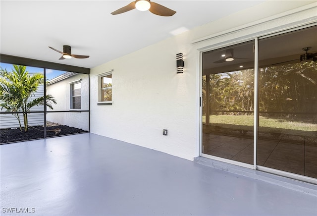 view of patio featuring ceiling fan