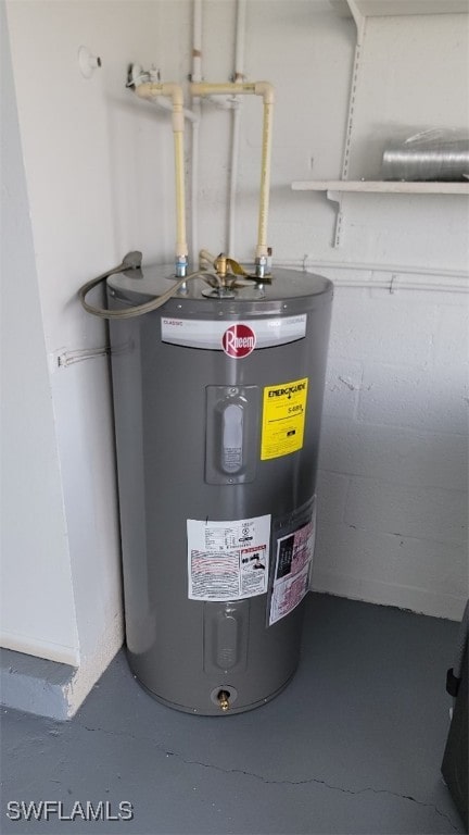 utility room featuring electric water heater