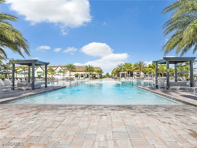 view of swimming pool featuring a patio