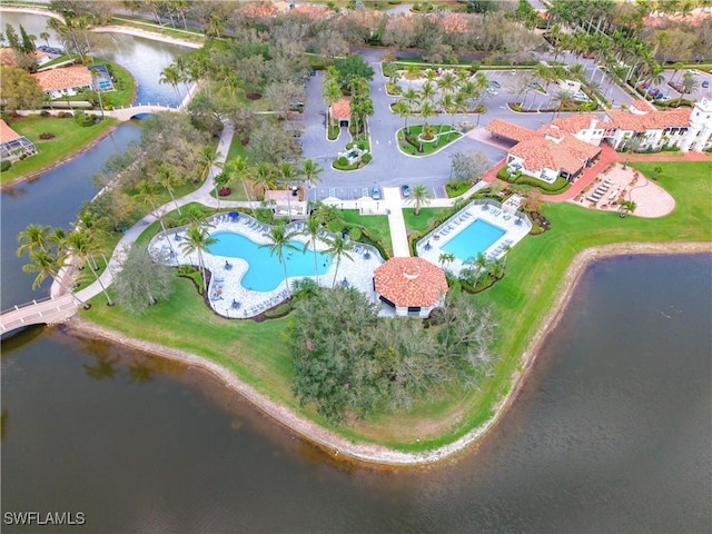 bird's eye view with a water view