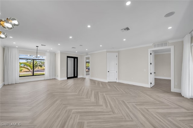 unfurnished living room with light parquet flooring, crown molding, and an inviting chandelier