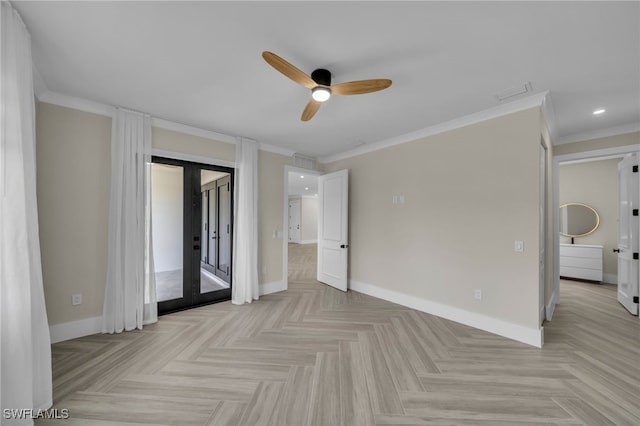 empty room featuring light parquet floors, crown molding, ceiling fan, and french doors