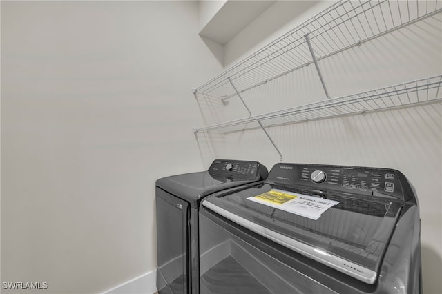 laundry area featuring washer and clothes dryer