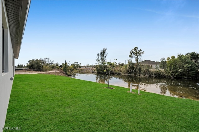 view of yard featuring a water view