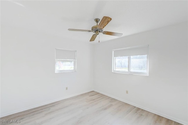 unfurnished room featuring light hardwood / wood-style floors and ceiling fan