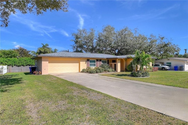 single story home with a garage and a front lawn