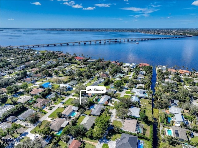 aerial view with a residential view and a water view