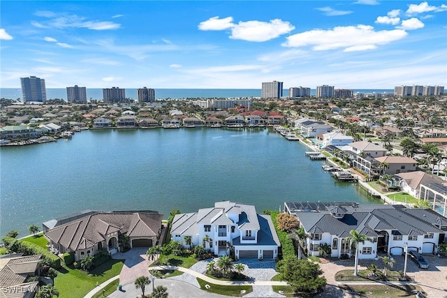 birds eye view of property featuring a water view