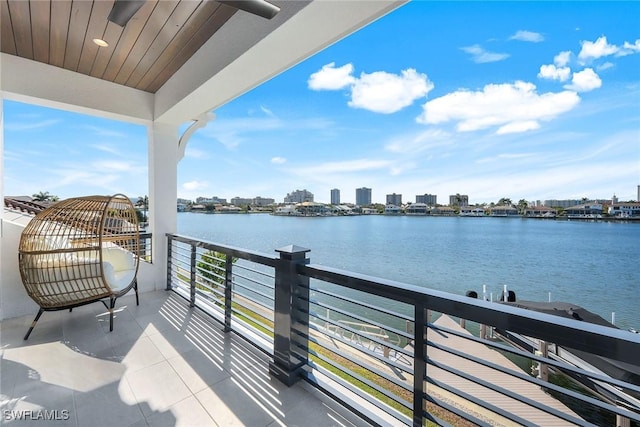 balcony featuring a water view