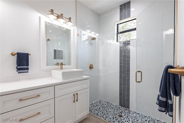 bathroom featuring vanity and walk in shower