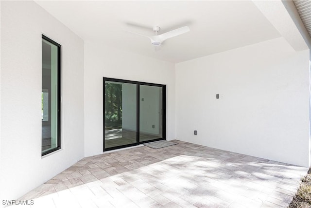 view of patio with ceiling fan